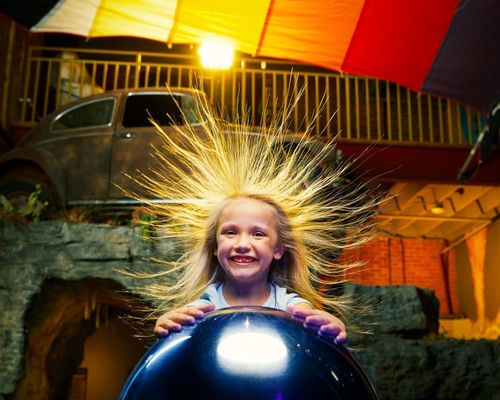A child interacts with an exhibit at the Discovery Center of Springfield.