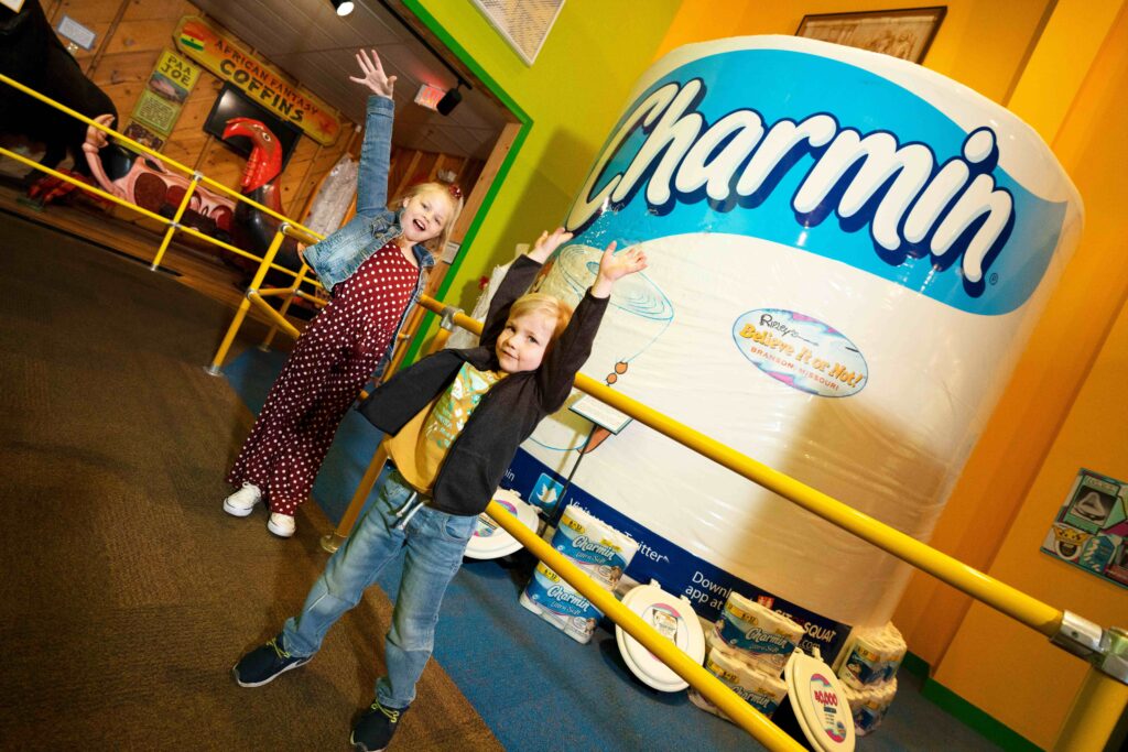 A child in front of a giant Charmin display inside Ripley's Believe It or Not